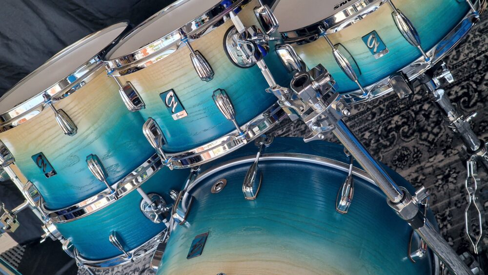 Caribe Blue Fade to Natural Ash over Walnut Drums - Image 7