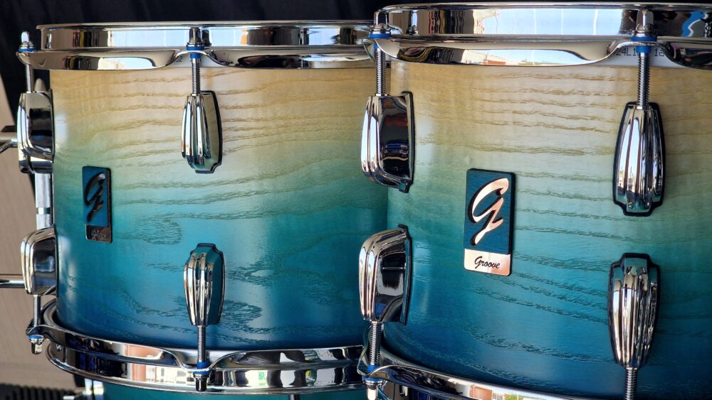 Caribe Blue Fade to Natural Ash over Walnut Drums - Image 8