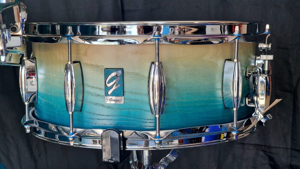 Caribe Blue Fade to Natural Ash over Walnut Drums - Image 9