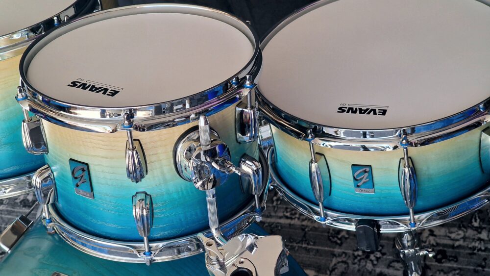 Caribe Blue Fade to Natural Ash over Walnut Drums - Image 10